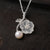 Silver pear blossom flower and freshwater pearl necklace