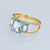 Trio Blue Topaz & Diamonds Gold Ring